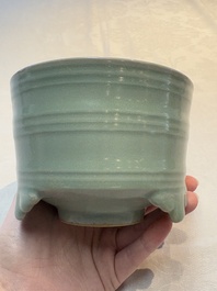 A Chinese Longquan celadon cylindrical tripod censer with &lsquo;trigrams&rsquo; design, Yuan/Ming
