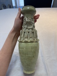 Two Chinese qingbai-glazed urns with applied design, Song