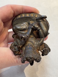 A small Nepalese bronze sculpture of Lokapala Dhritarashtra, 17th C.