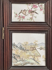 A rare Chinese eight-panel hongmu room divider with 48 qianjiang cai plaques, signed Jia Xingqing 贾醒卿, dated 1902