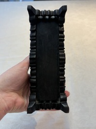 A pair of Chinese carved jade &lsquo;elephant&rsquo; plaques on wooden stands, 19th C.