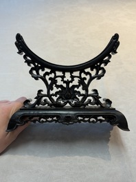 A pair of Chinese carved jade &lsquo;elephant&rsquo; plaques on wooden stands, 19th C.