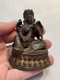 A small Nepalese bronze sculpture of Lokapala Dhritarashtra, 17th C.