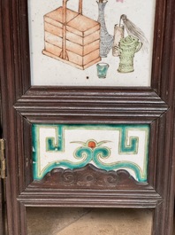 A rare Chinese eight-panel hongmu room divider with 48 qianjiang cai plaques, signed Jia Xingqing 贾醒卿, dated 1902
