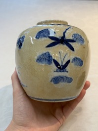 A Chinese famille verte covered vase, a pair of blue and white jars on wooden stands and two jars, 19th C.