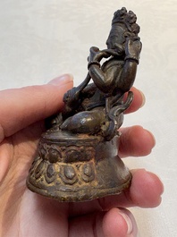 A small Nepalese bronze sculpture of Lokapala Dhritarashtra, 17th C.