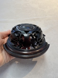 A Chinese Swatow cream-glazed tripod censer with wooden cover, 18/19th C.