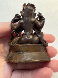 A small Nepalese bronze sculpture of Lokapala Dhritarashtra, 17th C.