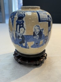 A Chinese famille verte covered vase, a pair of blue and white jars on wooden stands and two jars, 19th C.