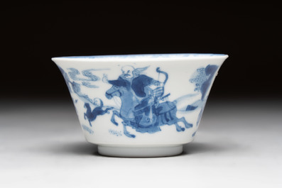 A Chinese blue and white 'Mongolian hunting' cup and saucer, jade mark, Kangxi