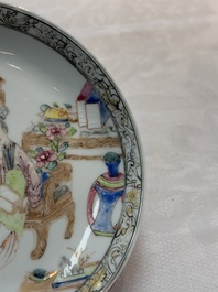 A Chinese famille rose saucer with two ladies and a boy, Yongzheng
