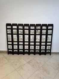 A rare Chinese eight-panel hongmu room divider with 48 qianjiang cai plaques, signed Jia Xingqing 贾醒卿, dated 1902