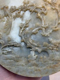 A pair of Chinese carved jade &lsquo;elephant&rsquo; plaques on wooden stands, 19th C.