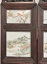 A rare Chinese eight-panel hongmu room divider with 48 qianjiang cai plaques, signed Jia Xingqing 贾醒卿, dated 1902