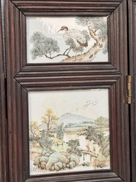A rare Chinese eight-panel hongmu room divider with 48 qianjiang cai plaques, signed Jia Xingqing 贾醒卿, dated 1902