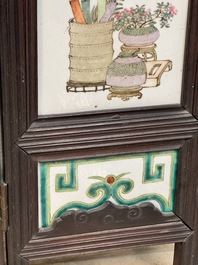 A rare Chinese eight-panel hongmu room divider with 48 qianjiang cai plaques, signed Jia Xingqing 贾醒卿, dated 1902