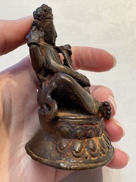 A small Nepalese bronze sculpture of Lokapala Dhritarashtra, 17th C.