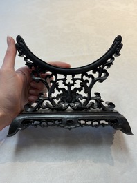 A pair of Chinese carved jade &lsquo;elephant&rsquo; plaques on wooden stands, 19th C.