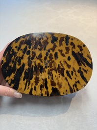A fine and rare Chinese tortoiseshell-veneered and red-lacquered oval box and cover, signed Wang Wenzhi 王文治, Qianlong mark and of the period