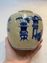 A Chinese famille verte covered vase, a pair of blue and white jars on wooden stands and two jars, 19th C.