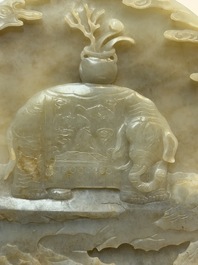 A pair of Chinese carved jade &lsquo;elephant&rsquo; plaques on wooden stands, 19th C.