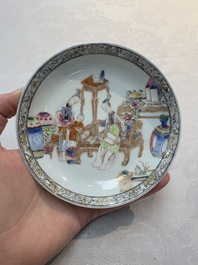 A Chinese famille rose saucer with two ladies and a boy, Yongzheng