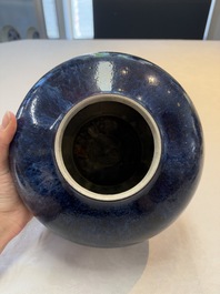 A Chinese flamb&eacute;-glazed vase on wooden stand, 19th C.