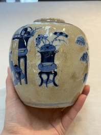 A Chinese famille verte covered vase, a pair of blue and white jars on wooden stands and two jars, 19th C.