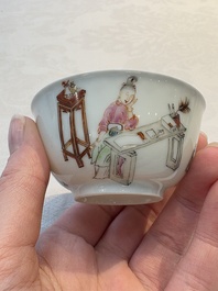 A Chinese iron-red-decorated 'boy and buffalo' cup and saucer and a famille rose 'Xi Xiang Ji' cup and saucer, Qianlong