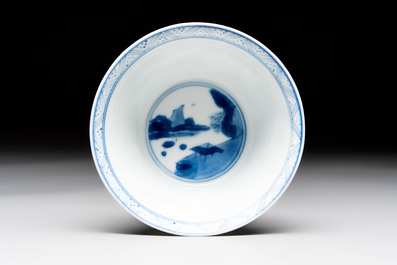 A Chinese blue and white 'Mongolian hunting' cup and saucer, jade mark, Kangxi