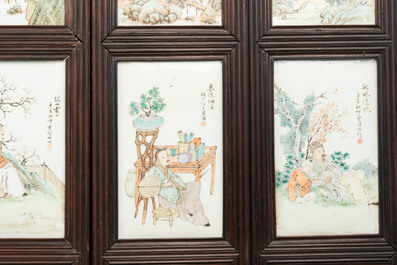 A rare Chinese eight-panel hongmu room divider with 48 qianjiang cai plaques, signed Jia Xingqing 贾醒卿, dated 1902