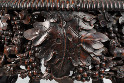 A Chinese finely carved hongmu marble top oval table, Canton, 19th C.
