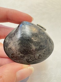 A small Chinese silver clam-shaped box with animals design, Tang/Song