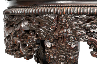 A Chinese finely carved hongmu marble top oval table, Canton, 19th C.