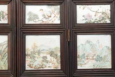 A rare Chinese eight-panel hongmu room divider with 48 qianjiang cai plaques, signed Jia Xingqing 贾醒卿, dated 1902