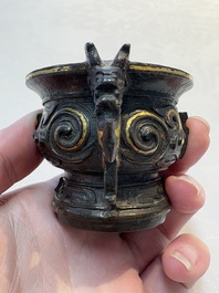 A Chinese archaistic gold and silver-inlaid bronze miniature censer, Ming