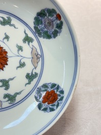 A Chinese doucai plate with stylized floral design, Chenghua mark, Kangxi/Yongzheng