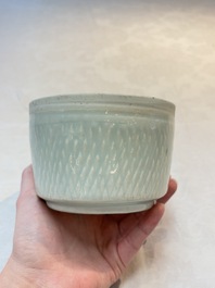A Chinese qingbai bowl with castor relief design, Song