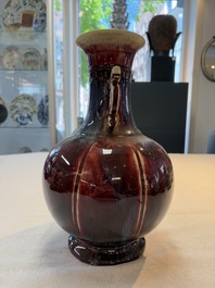 A Chinese flamb&eacute;-glazed vase with 'chilong' handles, 19th C.