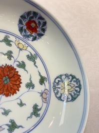 A Chinese doucai plate with stylized floral design, Chenghua mark, Kangxi/Yongzheng