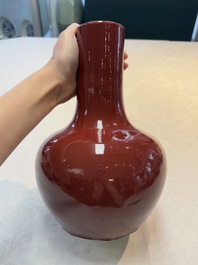 A Chinese copper-red-glazed bottle vase, 19th C.
