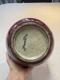 A Chinese copper-red-glazed bottle vase, 19th C.