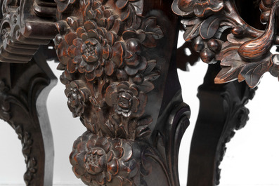 A Chinese finely carved hongmu marble top oval table, Canton, 19th C.