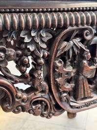 A Chinese finely carved hongmu marble top oval table, Canton, 19th C.
