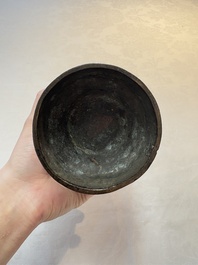 A Chinese parcel-gilt bronze vase with dragon-form handles, Yuan/Ming