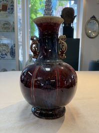 A Chinese flamb&eacute;-glazed vase with 'chilong' handles, 19th C.