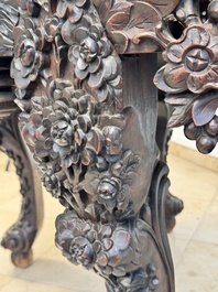 A Chinese finely carved hongmu marble top oval table, Canton, 19th C.