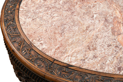 A Chinese finely carved hongmu marble top oval table, Canton, 19th C.