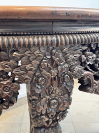 A Chinese finely carved hongmu marble top oval table, Canton, 19th C.