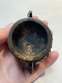 A Chinese archaistic gold and silver-inlaid bronze miniature censer, Ming